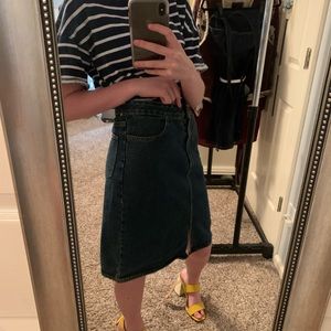 Knee length jean skirt with a split in the front